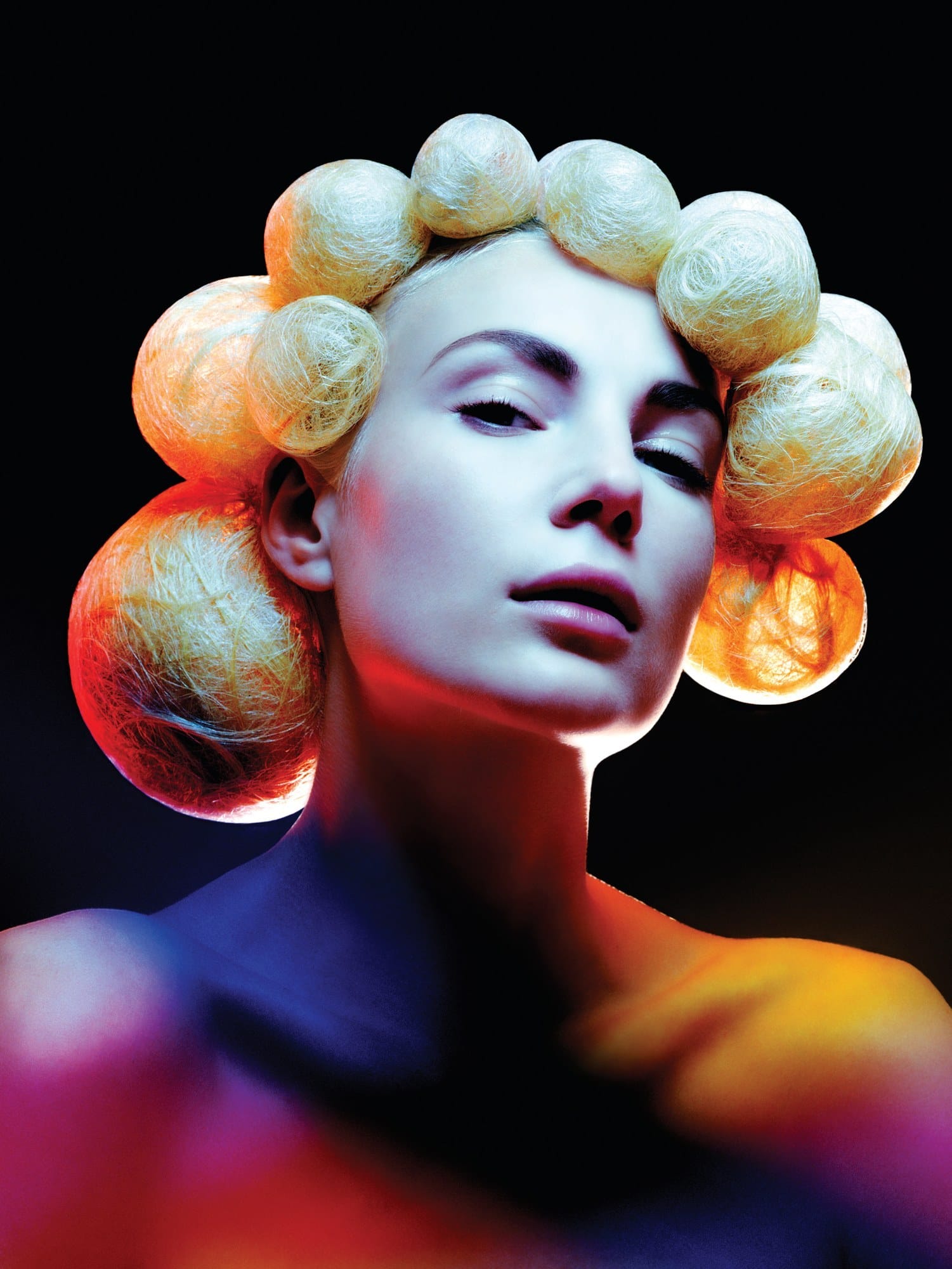 Blonde hair sculpted into a ring of weightless orbs – Avant Garde by Darren Ambrose
