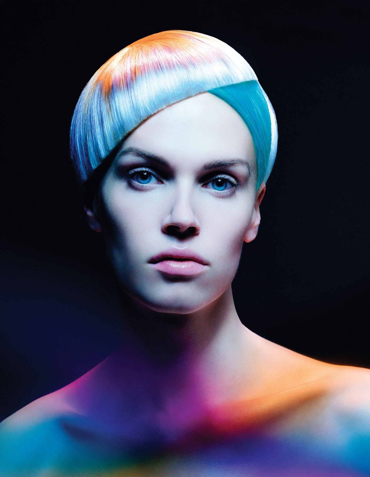 Sleek porcelain sculpted blonde in cool prismatic light – Avant Garde by Darren Ambrose