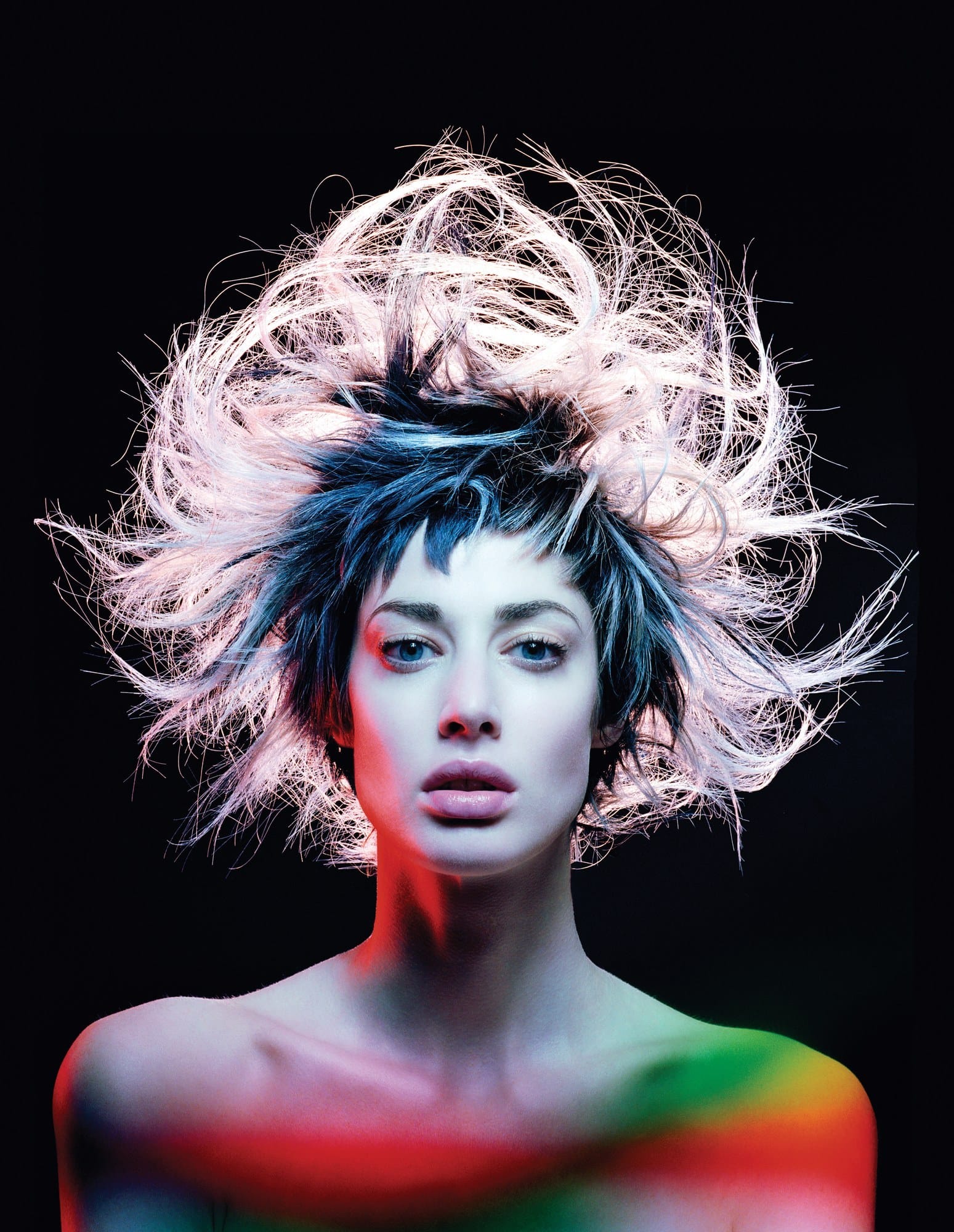 Sleek blue-lit blonde cap with clean, ink-porcelain colour – Avant Garde by Darren Ambrose