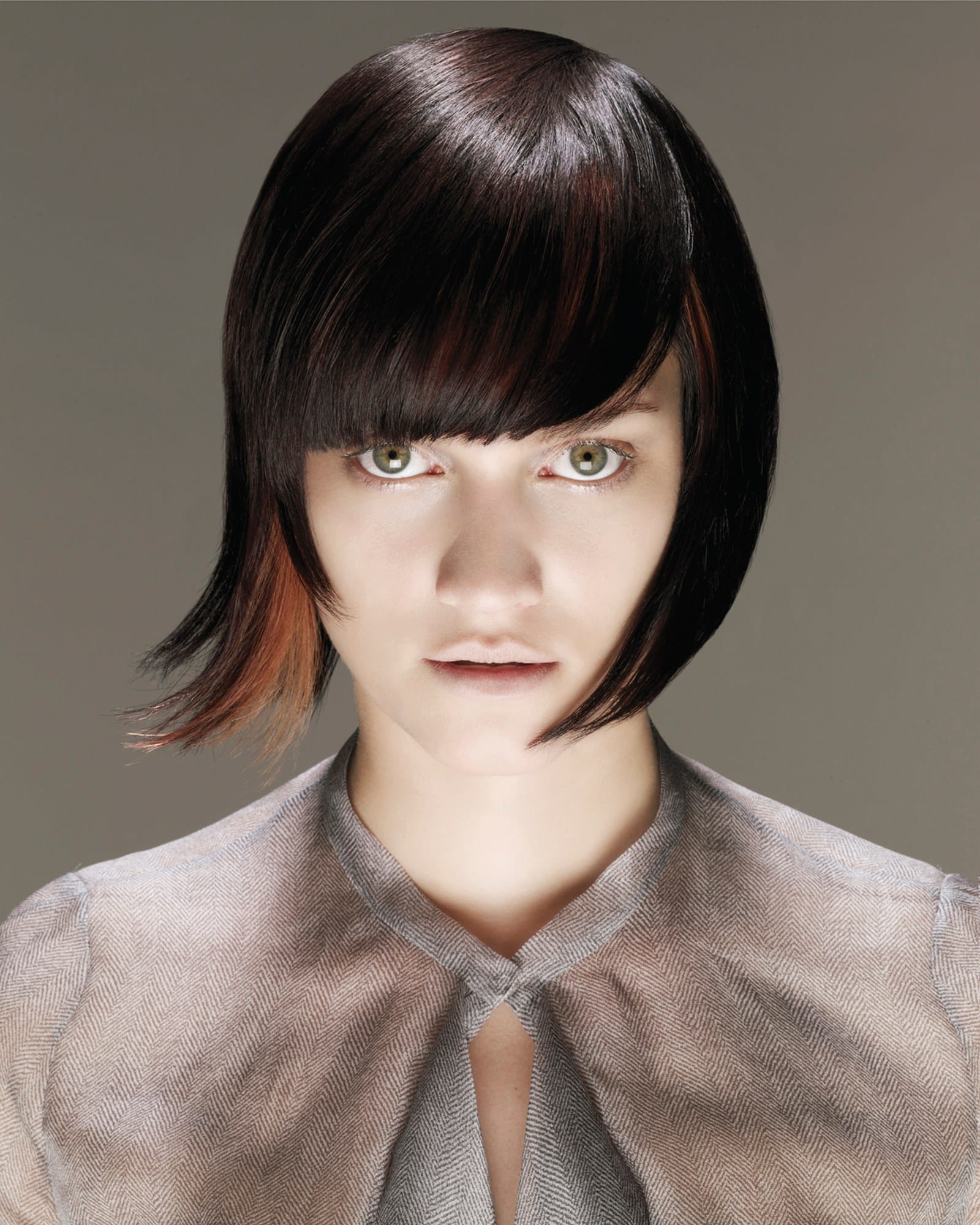 Rich red sleek finish with a heavy blunt fringe – Essensuals Evolution by Yumi Nakada-Dingle 2006