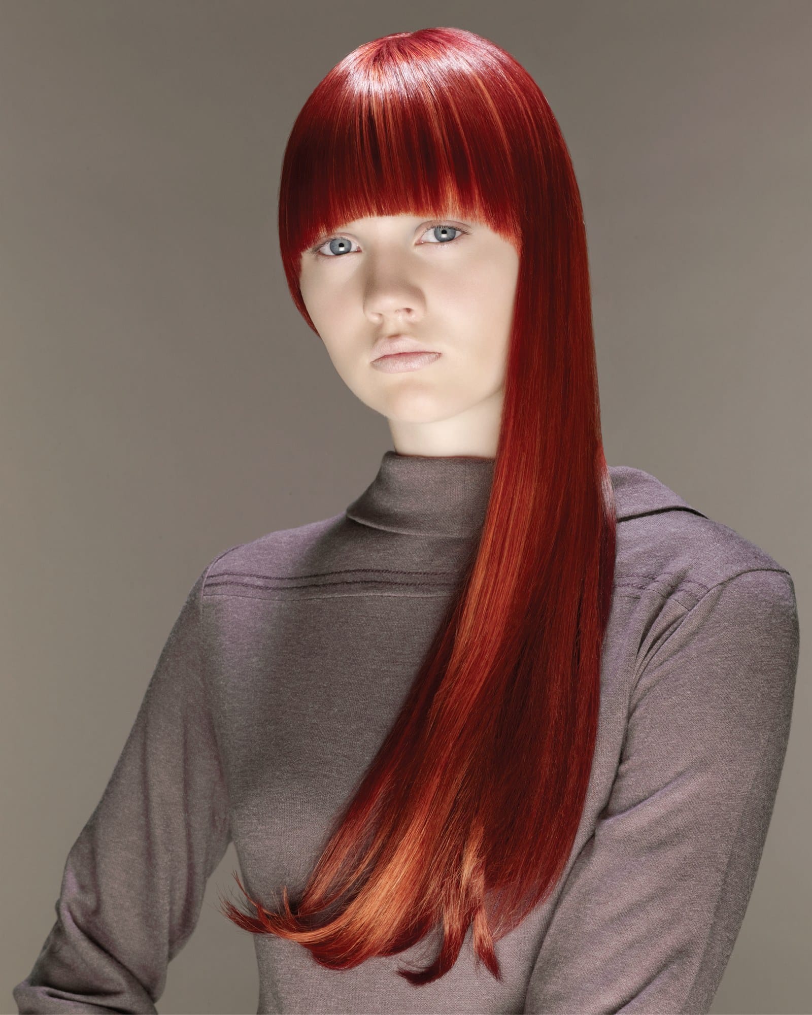 Copper side-swept fringe sweeping across the eye – Essensuals Evolution, Toni & Guy