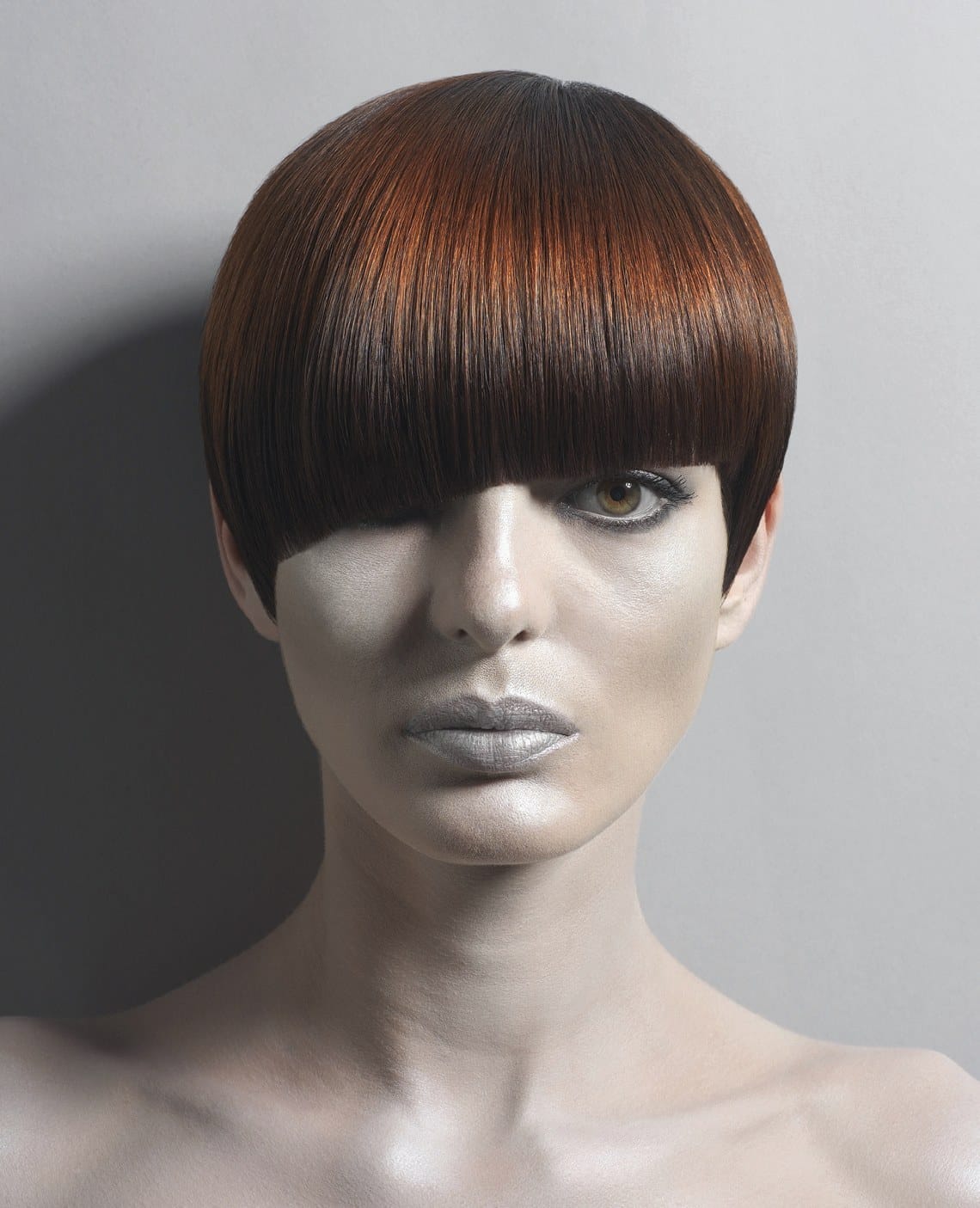 Deep bowl-cut fringe skimming one eye – Alien Nation Collection, Monroe Hairdressing 2007