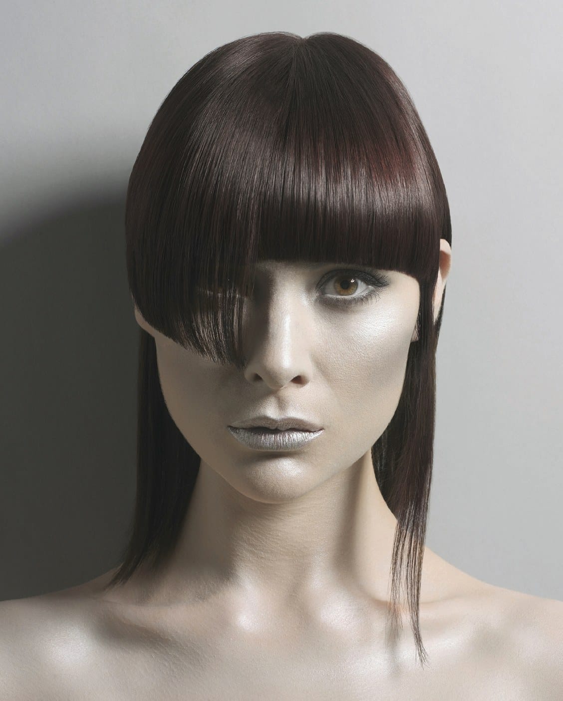 Long sleek hair with a sharp asymmetric fringe – Alien Nation Collection, Monroe Hairdressing 2007