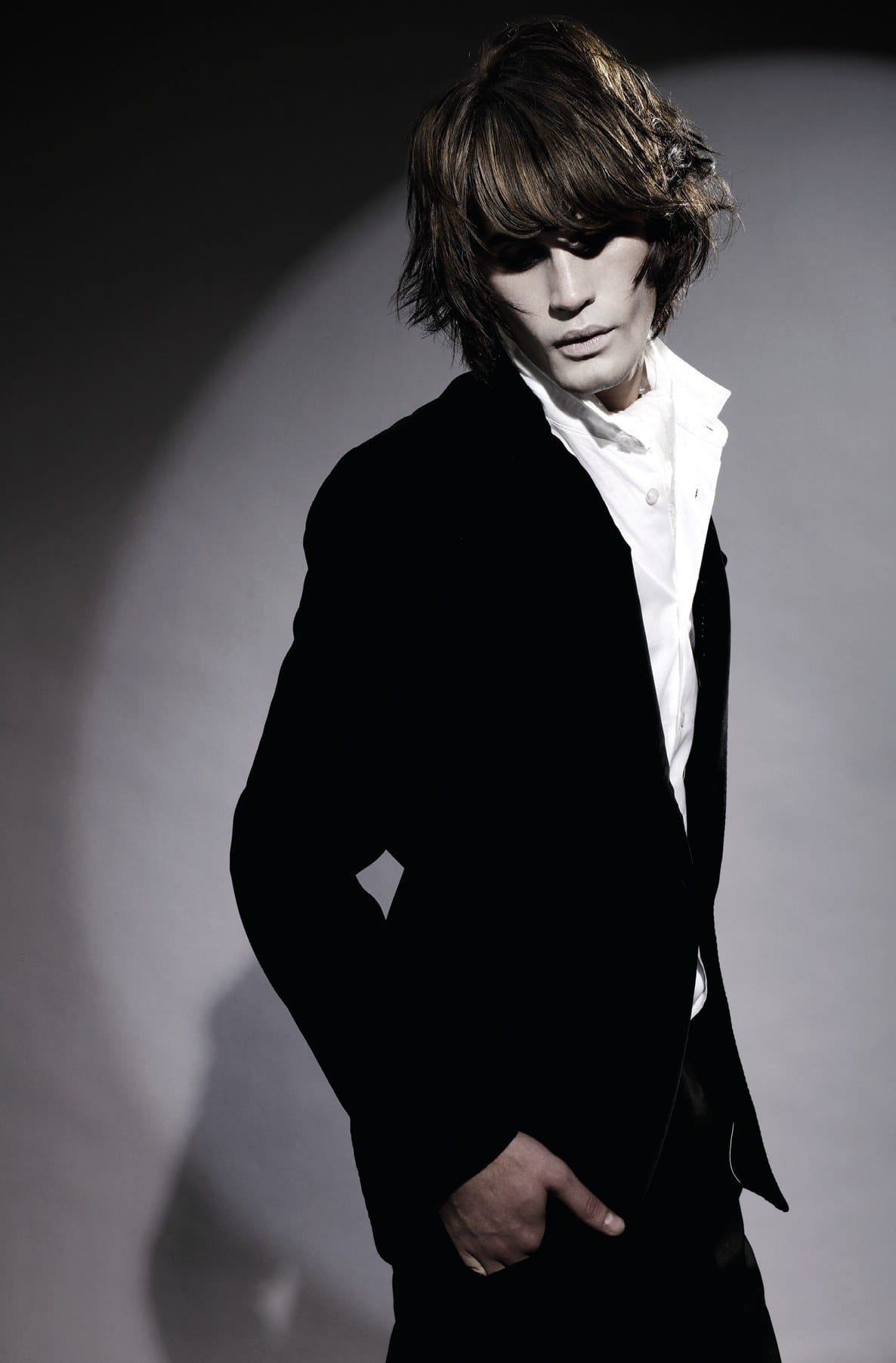 Shaggy shoulder-length brown layers falling across the face – Anime Men's Collection, Brooks & Brooks 2007