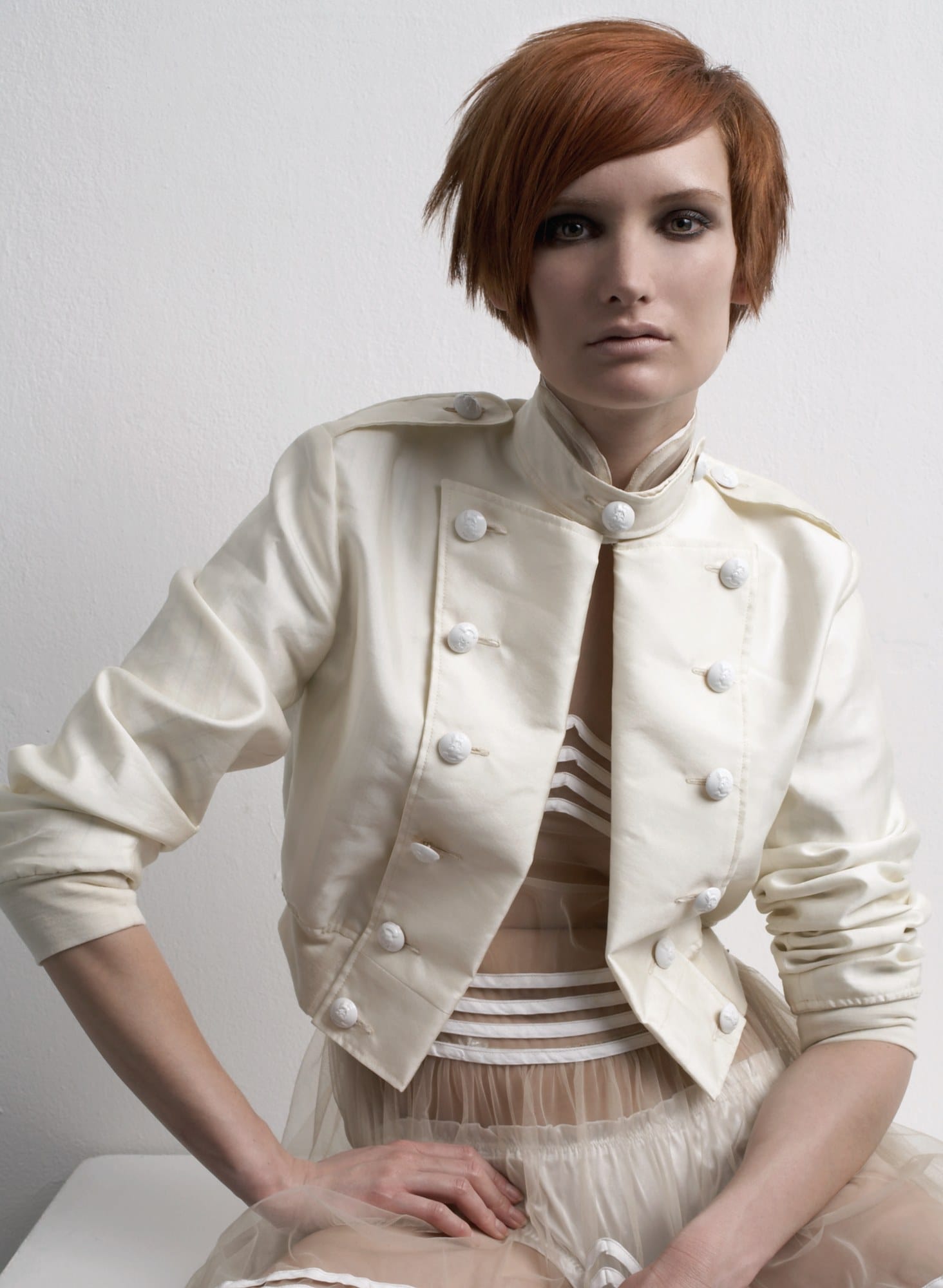 Short copper crop with a sweeping side fringe and a cream military jacket – Essensuals Collection, Louise Smith 2007