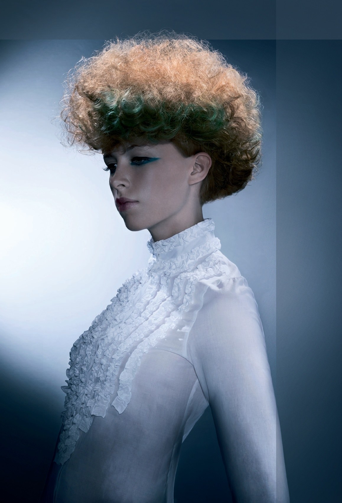 Copper curls with green tones, head turned in profile – Geoganic Collection, Sassoon 2008