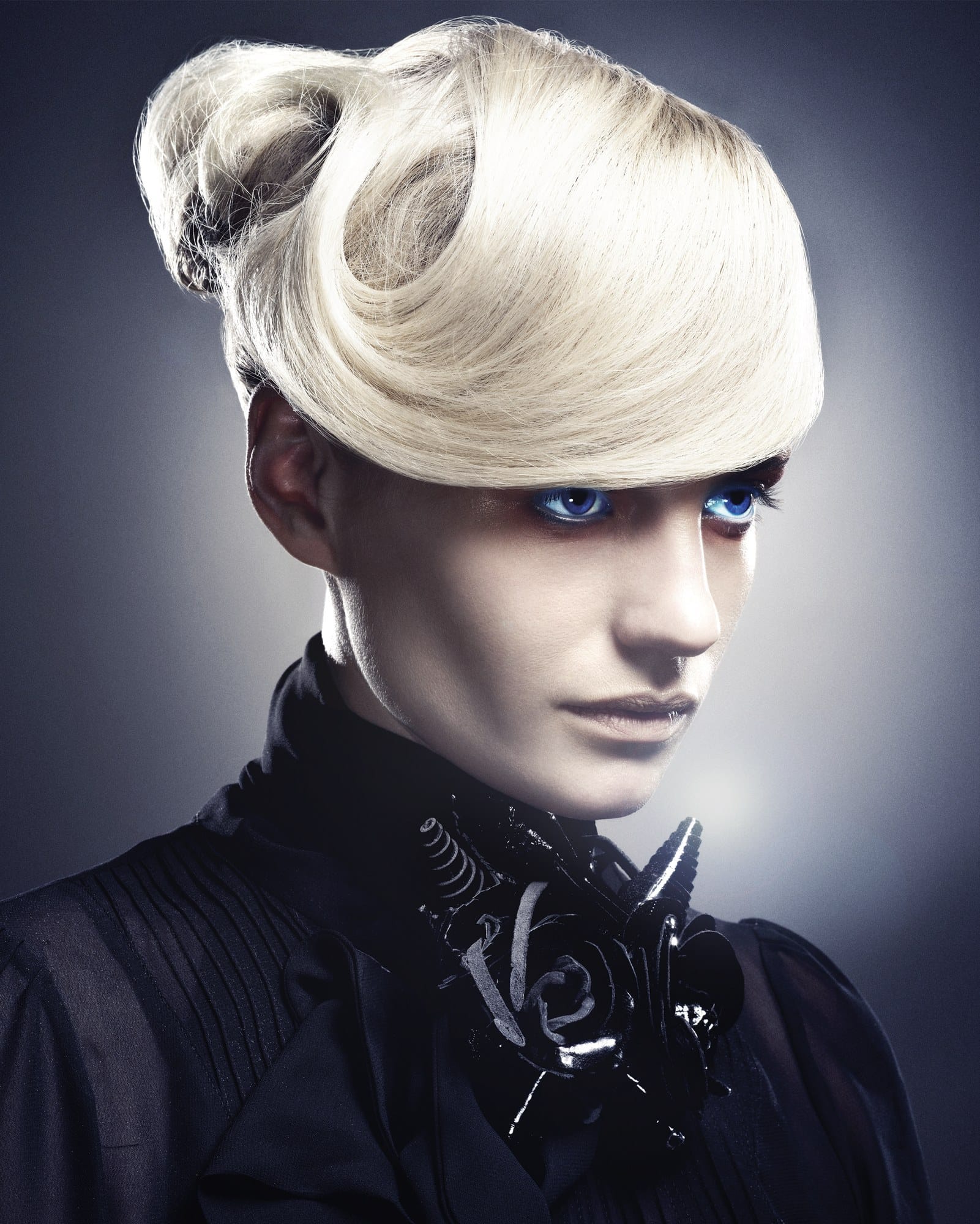 Platinum blonde hair swept into a sculpted top-knot with rolled curls and a spiked collar brooch – Hob Collection 2006/7, Claire Dawson 2007