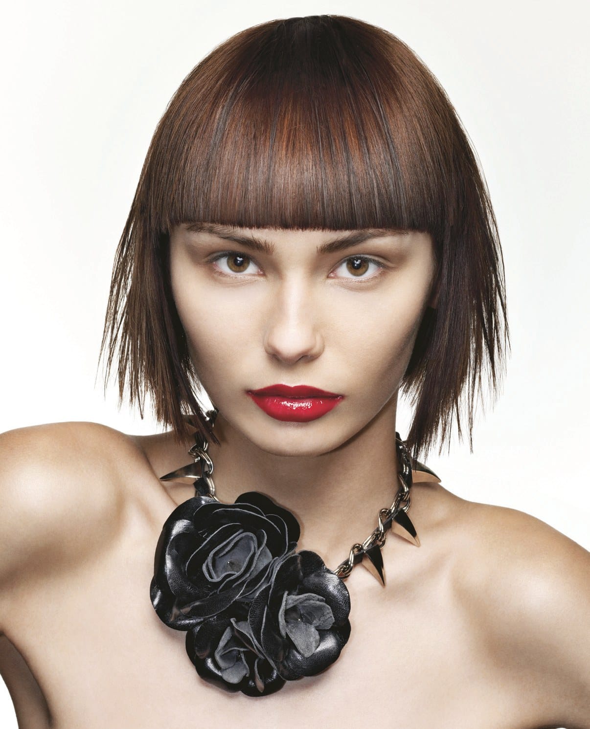 Asymmetric side-swept brunette bob with a black spiked rose choker – Hob Collection 2006/7, Kris Benns 2007