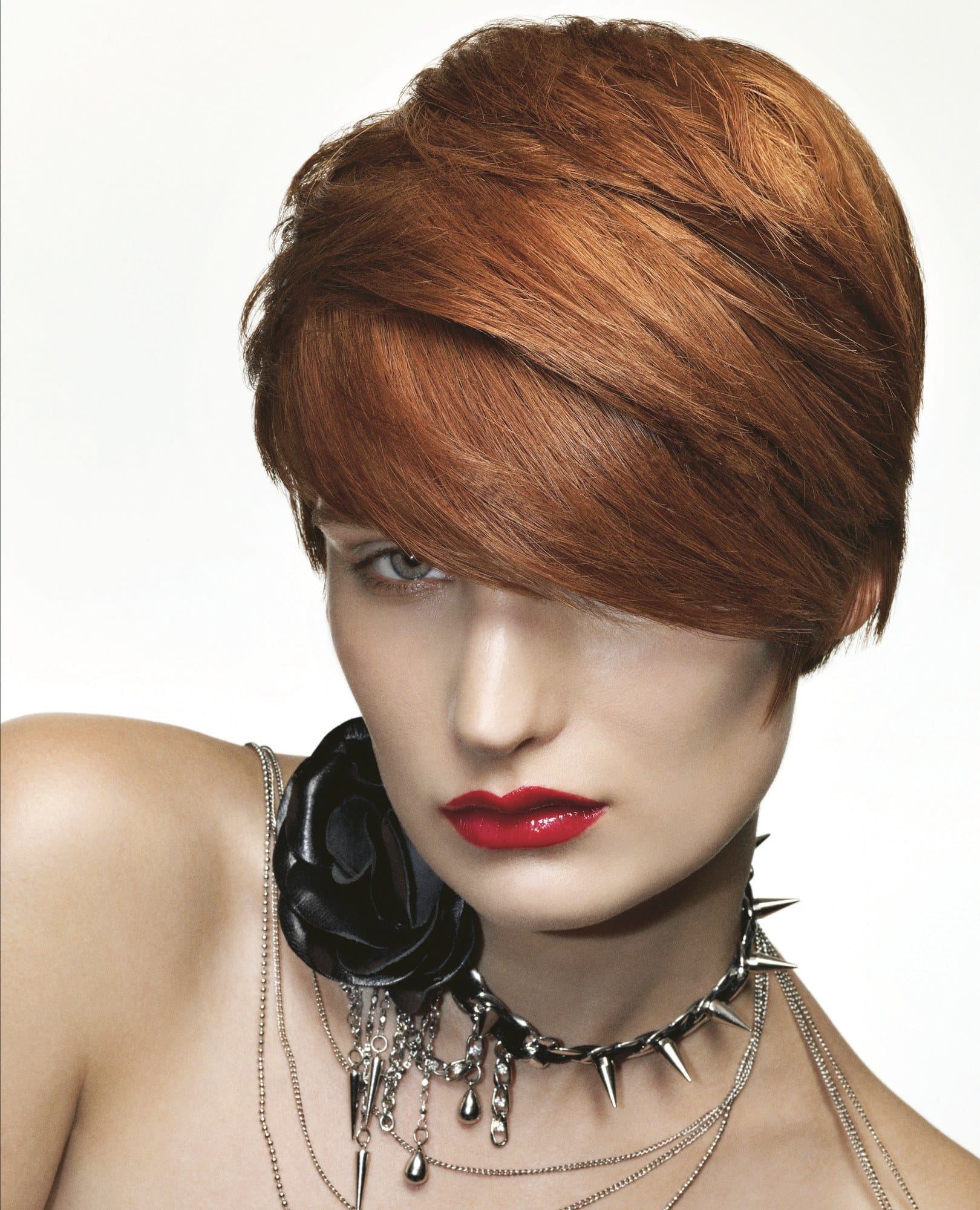 Copper auburn side-swept pixie crop with a spiked choker and dangling chain jewellery – Hob Collection 2006/7, Kris Benns 2007