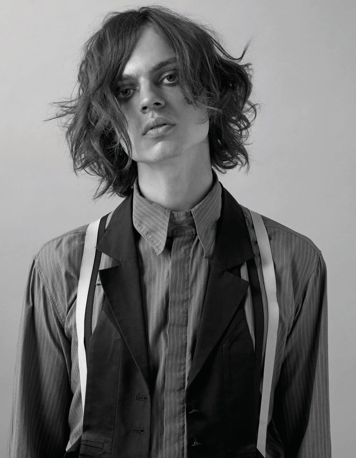 Tousled shoulder-length curls with messy volume, braces and waistcoat – Men's Collection, Dean Spearing TONI&GUY 2007