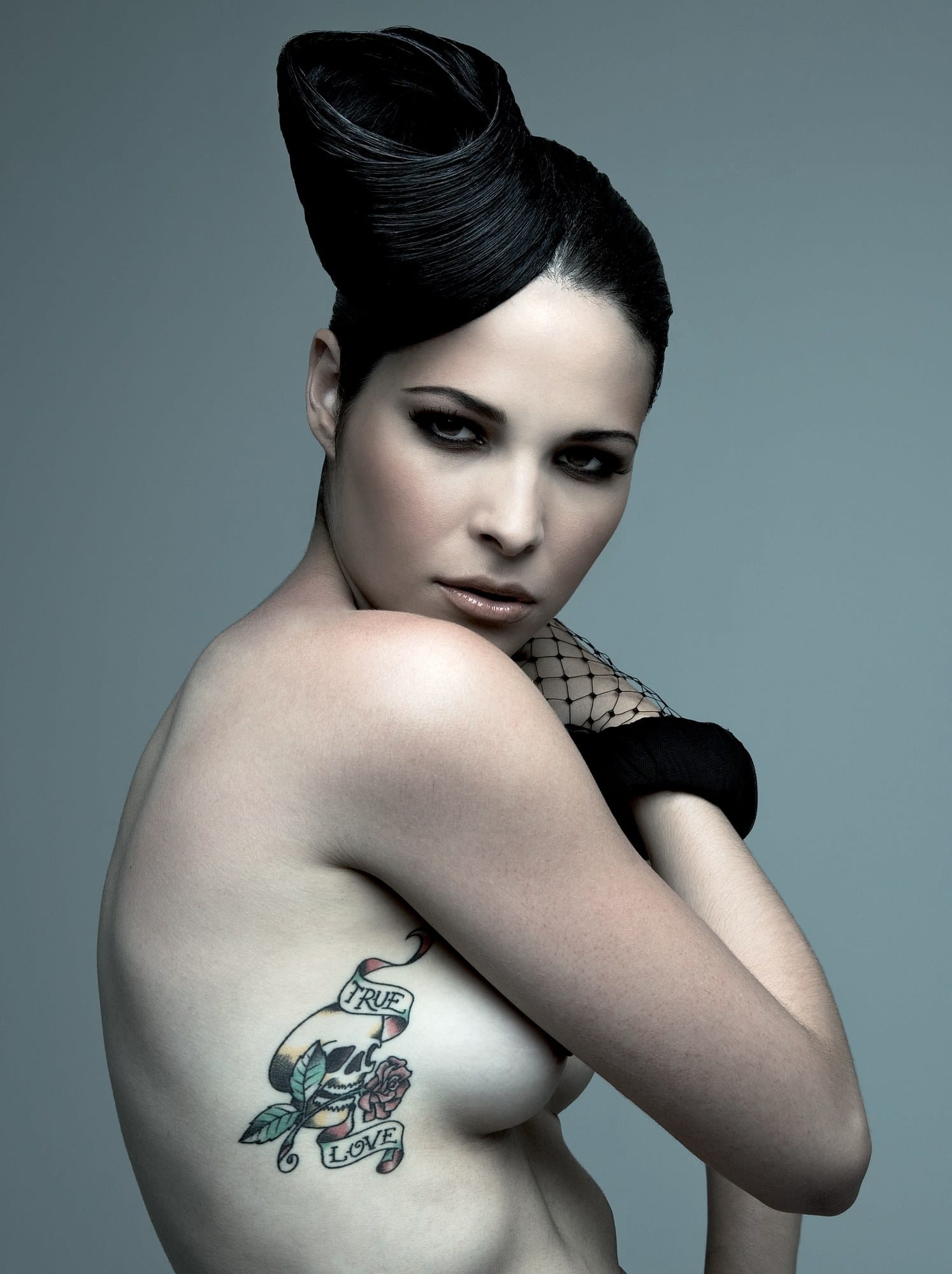 Sculpted black beehive with a sleek swept-back front – Naked Collection, Clipso Artistic Team 2007