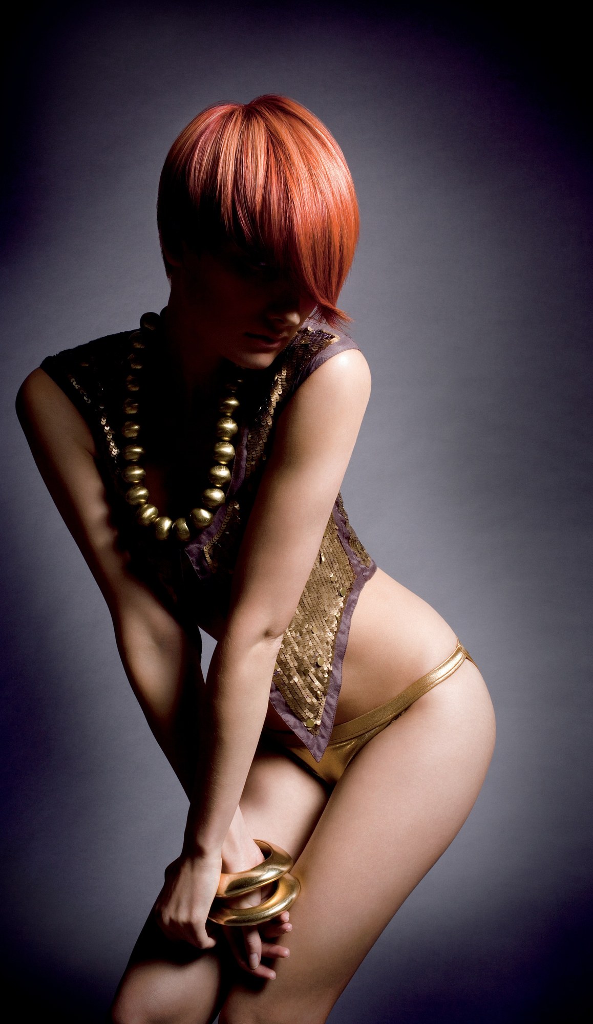 Red cropped cut with a heavy fringe, full-length pose – On Trend, In Colour Collection, Saks Art Team 2008