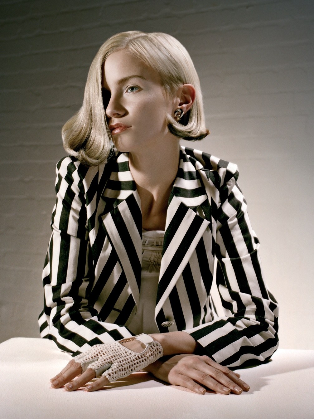 Sleek blonde waves swept to one side – Richard Ward for Racoon International 2008