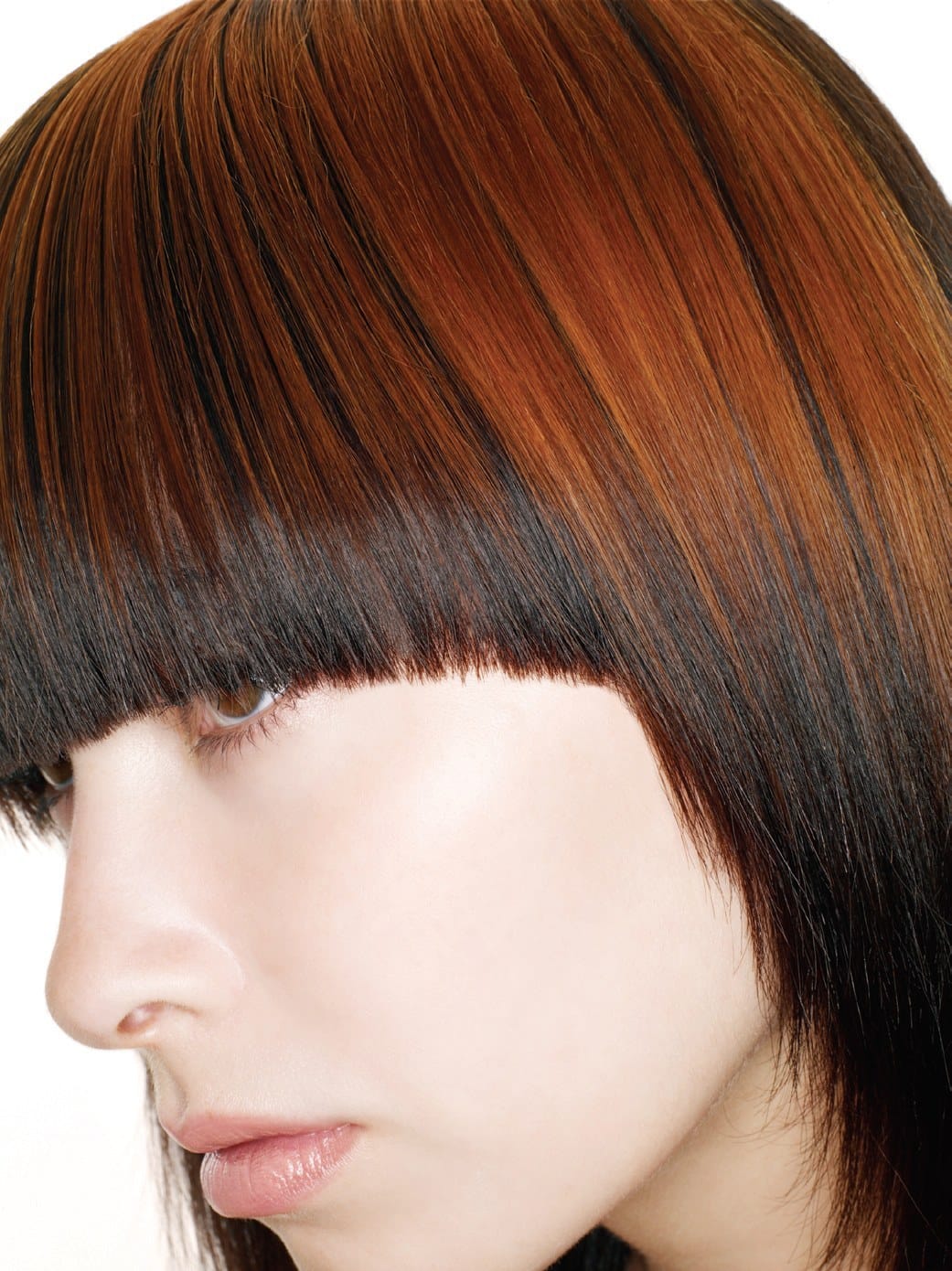 Blunt copper and chocolate bob with a solid fringe, profile view – Toni & Guy Collections, Jo O'Neill 2007