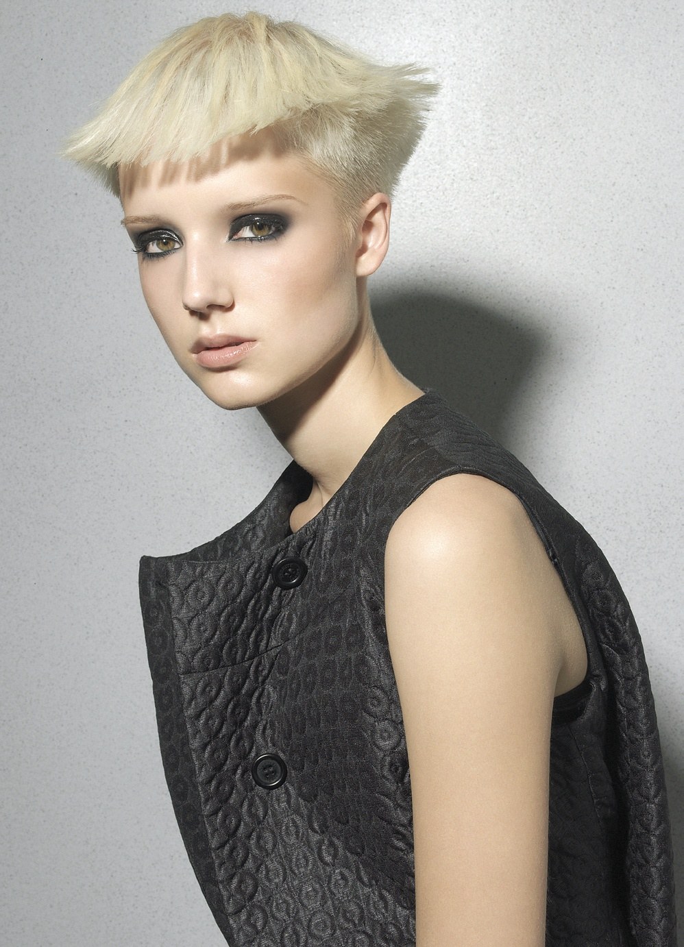 Platinum crop with a short choppy fringe, quilted waistcoat – Dare Collection, Suzie McGill 2008