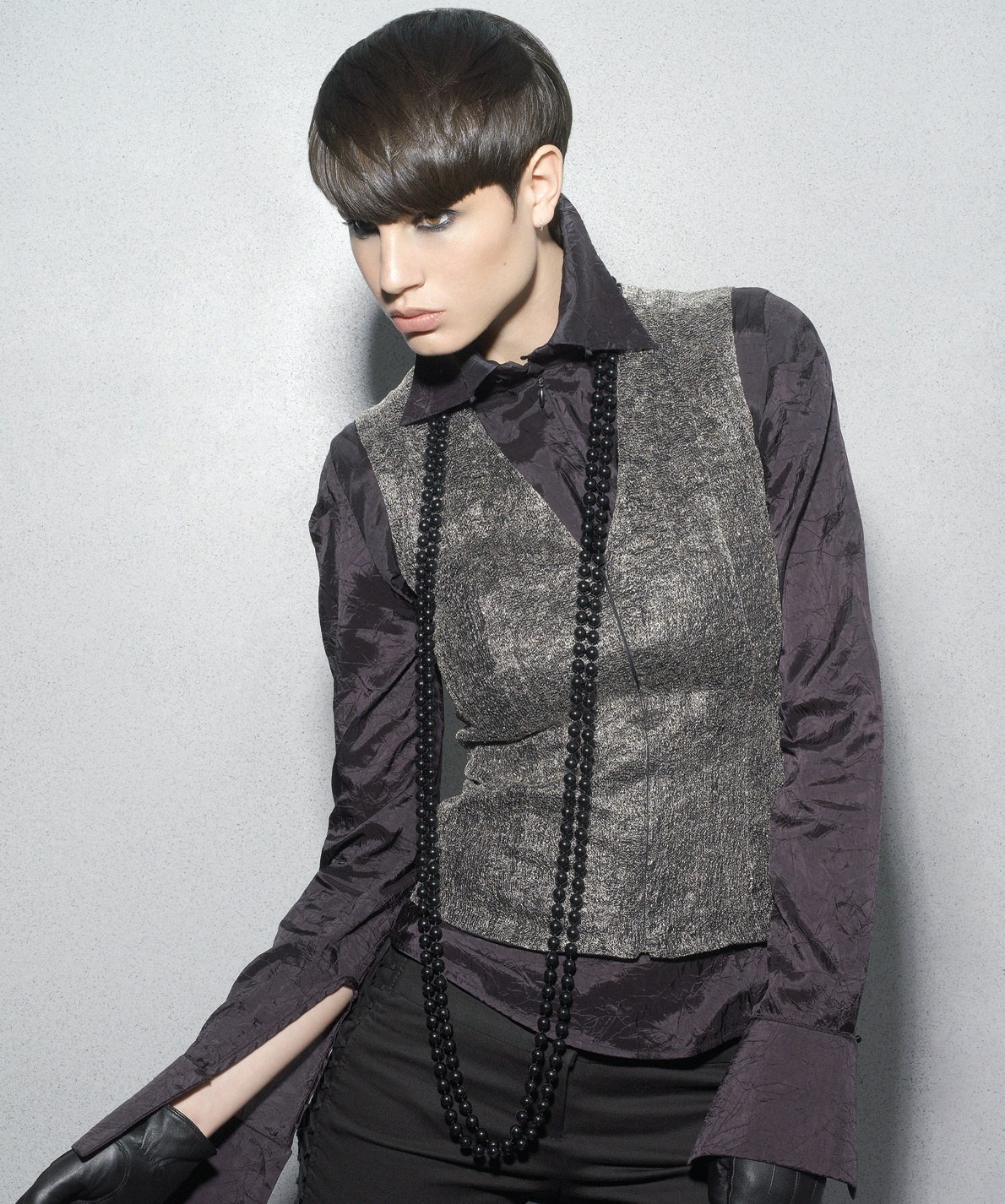 Dark brown mushroom bob with a heavy fringe, silver waistcoat – Dare Collection, Suzie McGill 2008