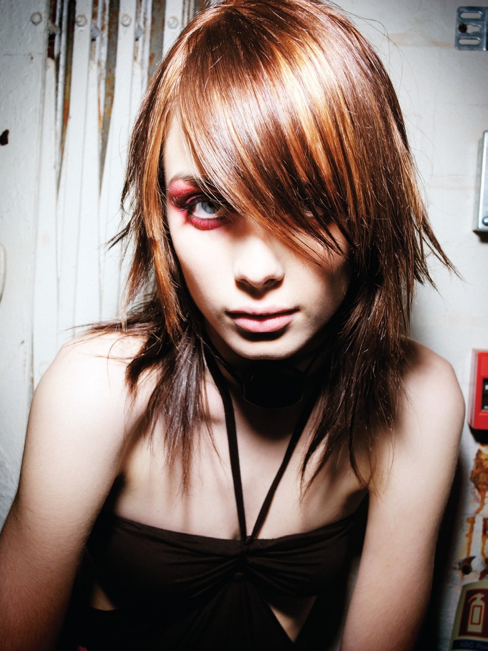 Copper and chocolate layers with a long side-swept fringe over one eye – Instinctive Collection, TIGI International Creative Team 2008
