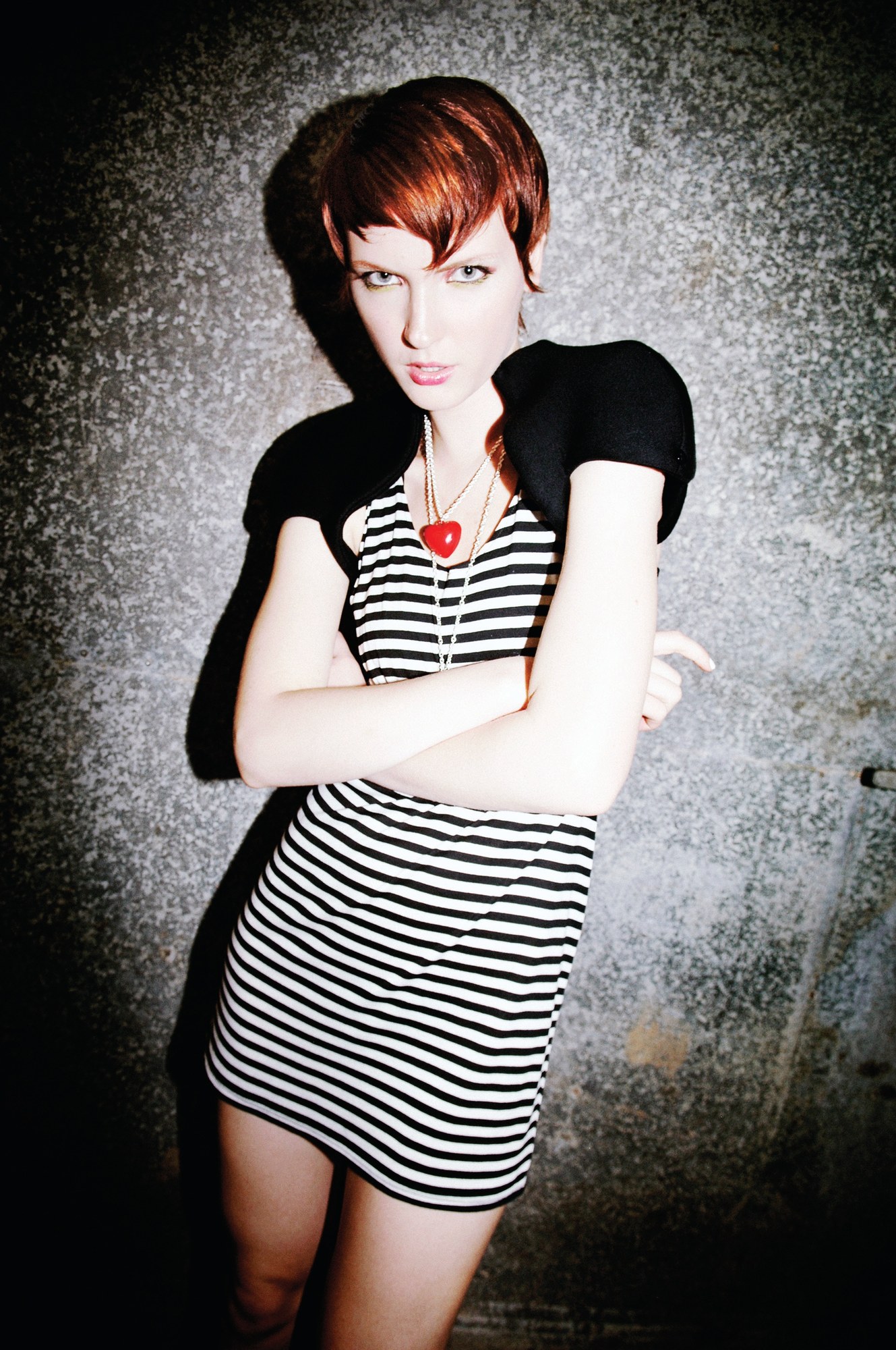Short tousled copper crop with a striped dress – Instinctive Collection, TIGI International Creative Team 2008