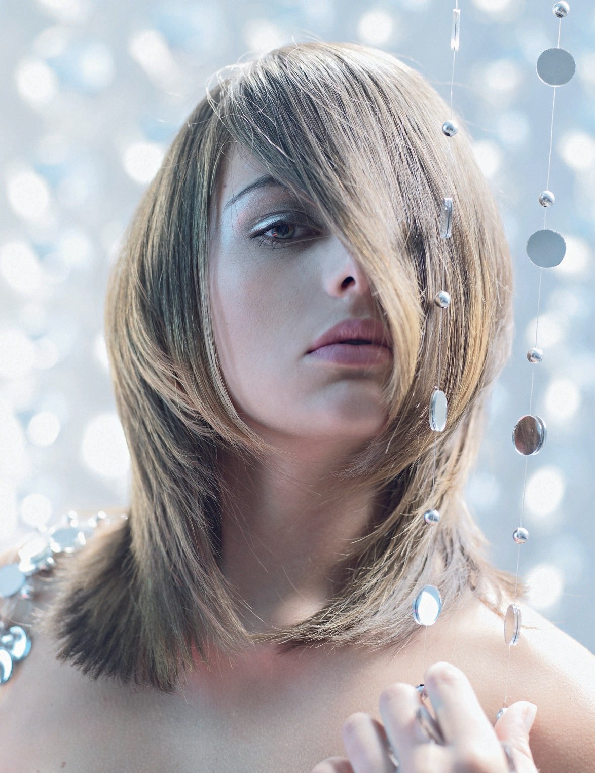 Shoulder-length layered blonde cut with a long fringe across one eye – Silver Collection, Bergamaschi Team 2008