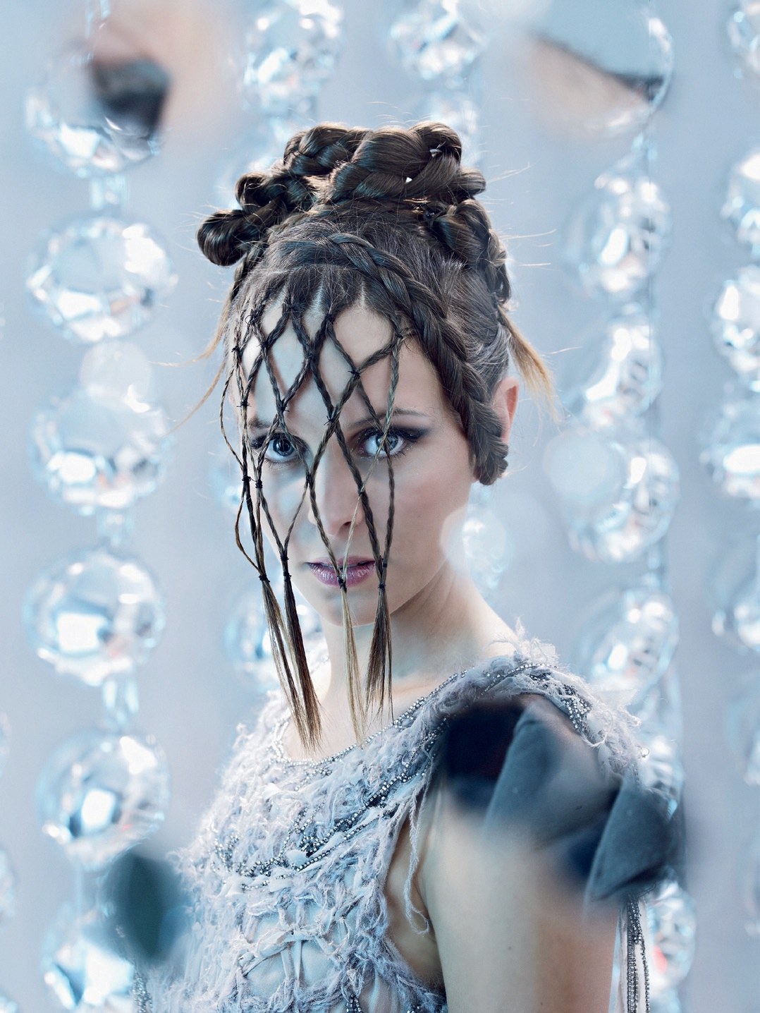 Sculpted updo with braided strands crossing the face – Silver Collection, Bergamaschi Team 2008
