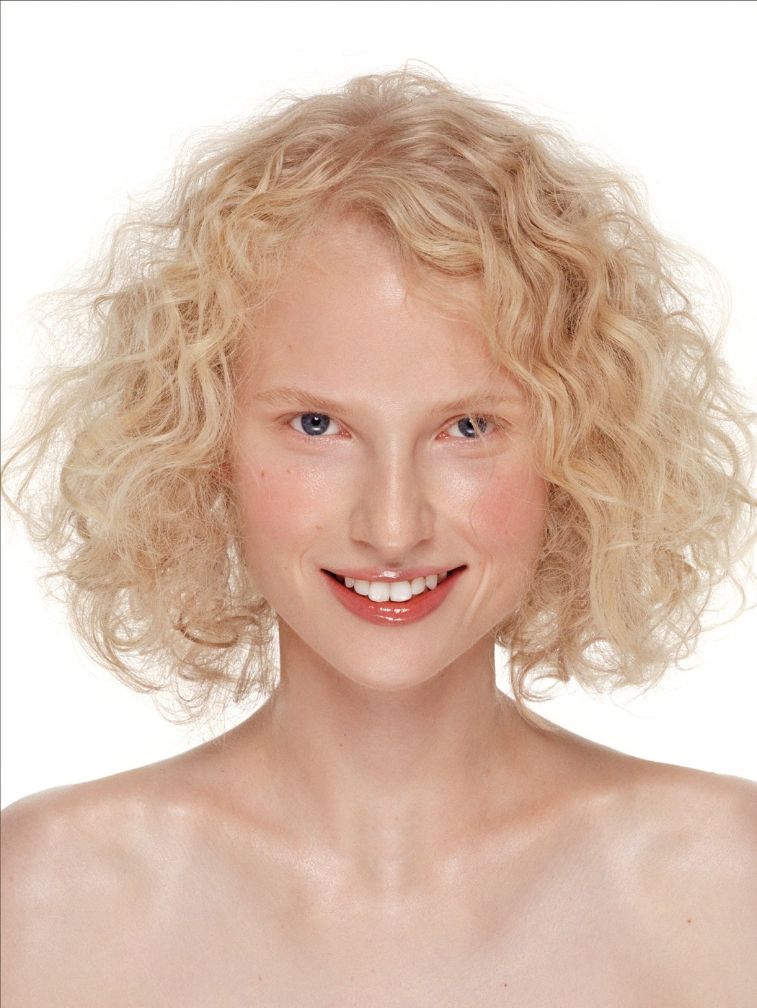 Voluminous blonde curls at chin length – Toni & Guy Collections, Phil Smith 2008